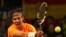 El tenista español Rafael Nadal en un partido contra el serbio Novak Djokovic.