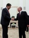 El presidente ruso Vladimir Putin y su homólogo venezolano Nicolás Maduro durante una reunión en el Kremlin este martes, 25 de septiembre. 